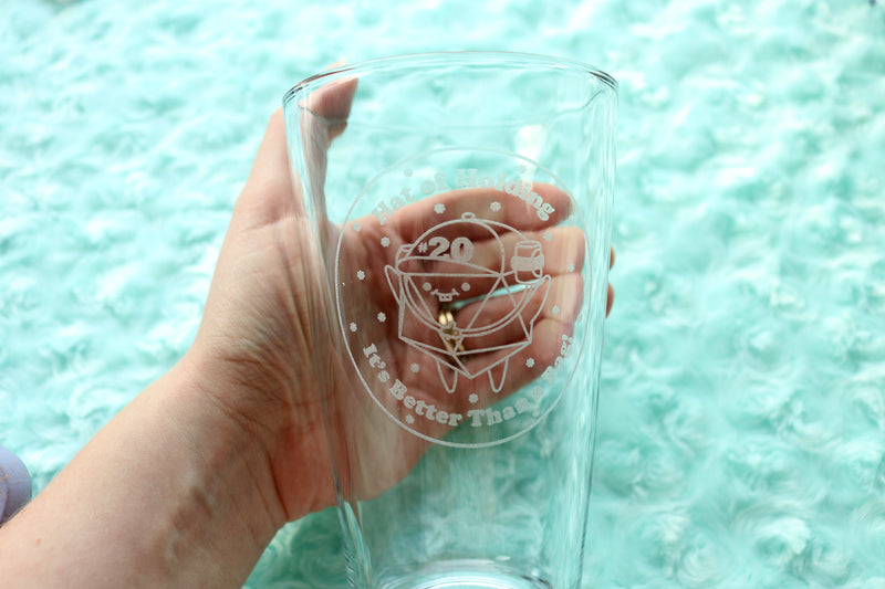 Hat of Holding Pint Glass