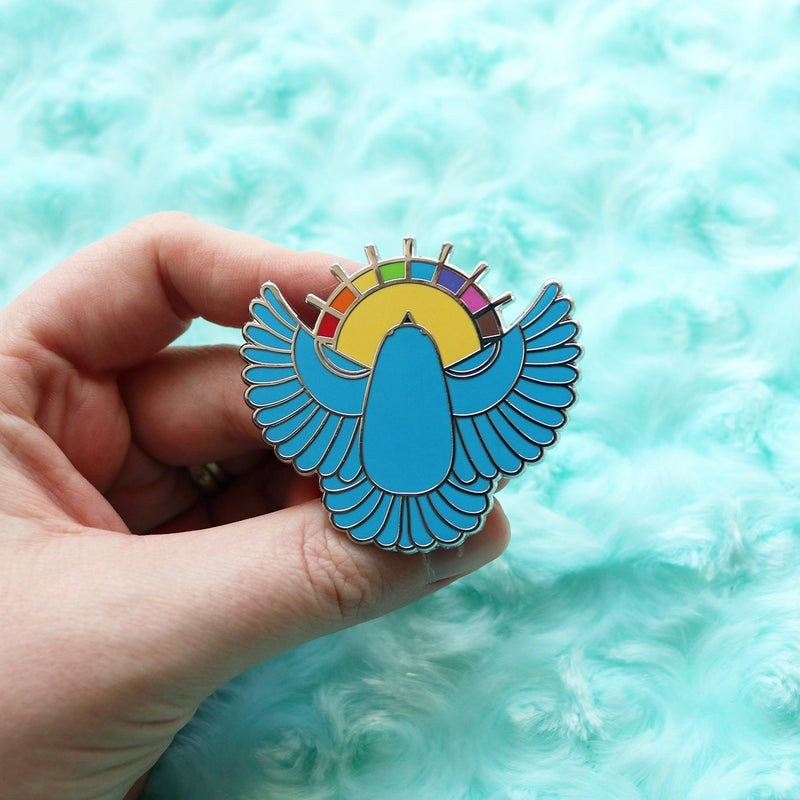 Holding Blue Bird Pin