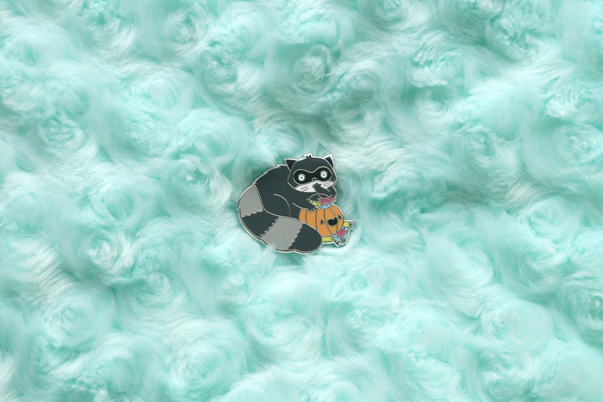 Funny halloween raccoon enamel pin