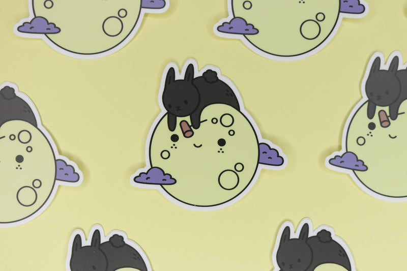 rows of black bunny on yellow moon stickers